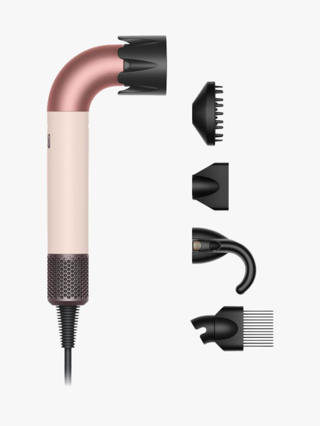 Dyson Supersonic r Hair Dryer in branded component with multiple attachments on a light gray background